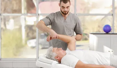 Senior Couple Walking Near The Queensway